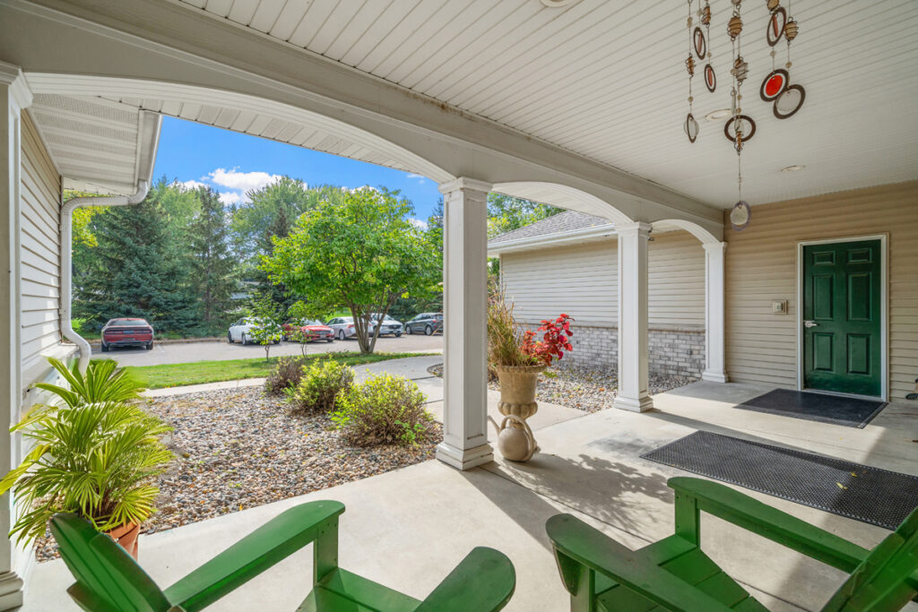 Inviting entrance at Emerald Crest Shakopee designed to provide a comfortable, home-like memory care environment.