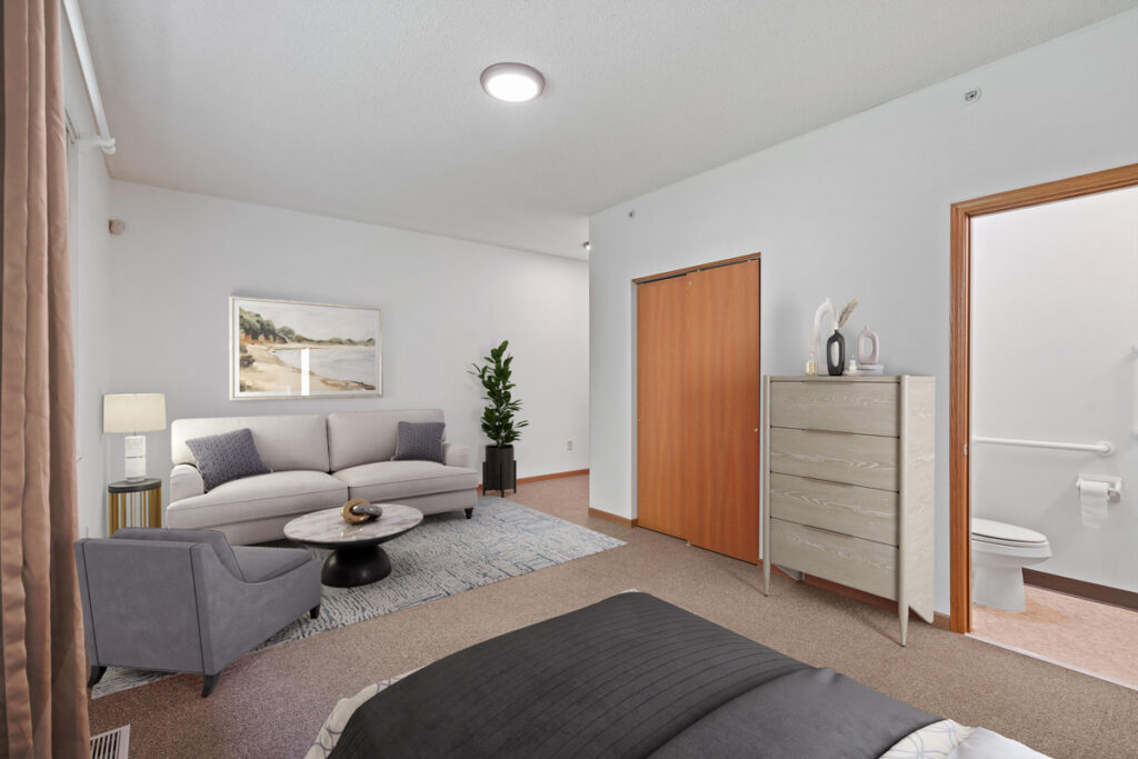Spacious private bedroom at Emerald Crest Shakopee providing a comfortable and supportive living environment for residents.