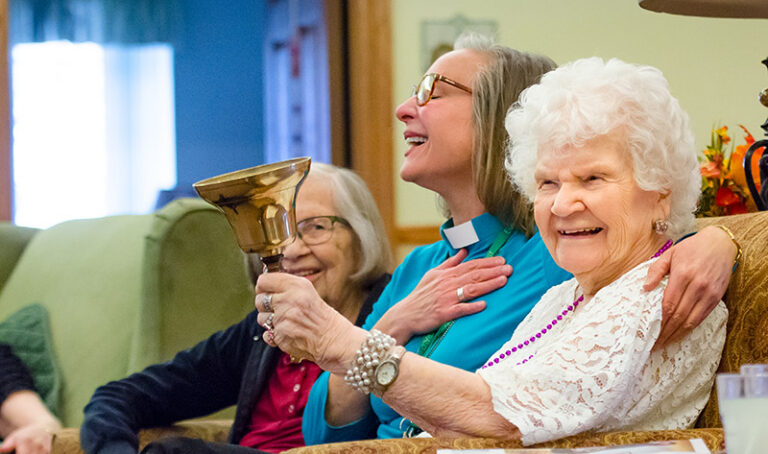 Residents participate in a spiritual care experience at Emerald Crest, supporting connection, comfort, worship, and meaningful engagement throughout every stage of dementia.